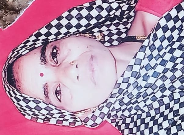 Woman dies after falling from roof