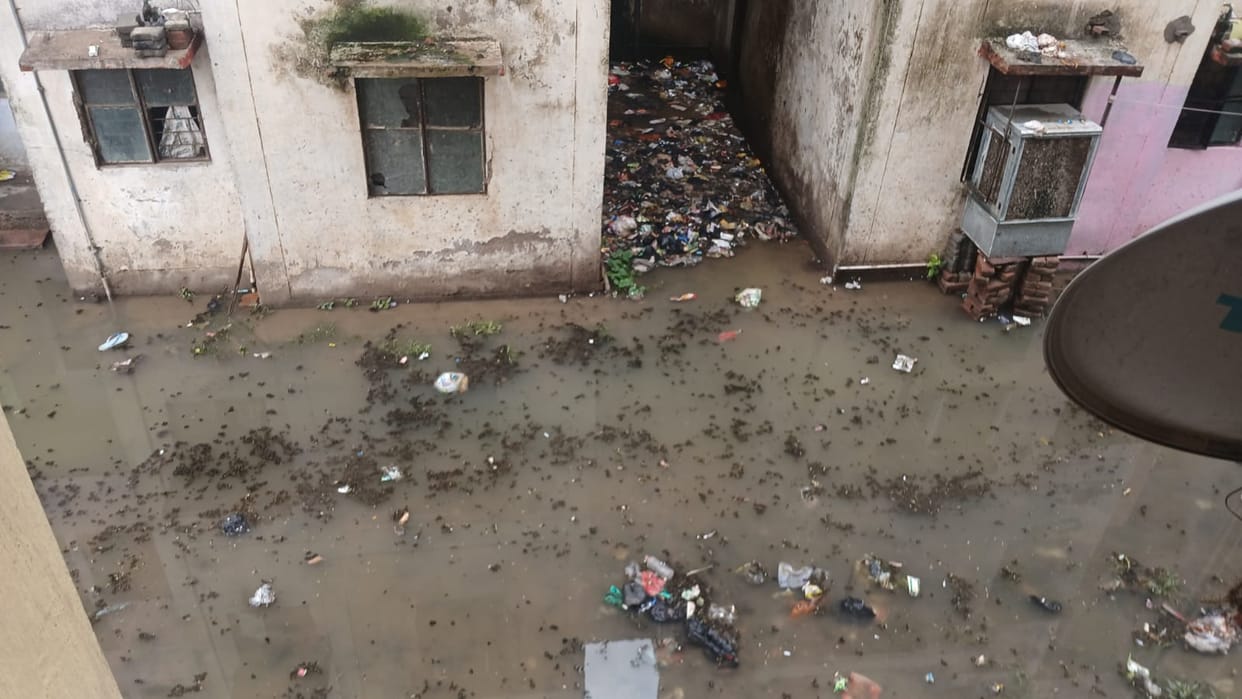 Water from drains entered houses and the temple during heavy rain.