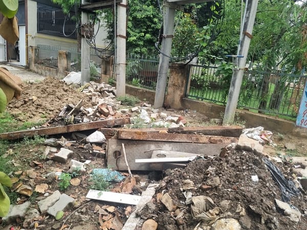 Silt left behind after drain cleaning; Municipal Council waiting for an accident to happen.