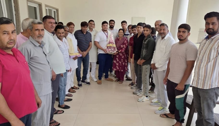 Wrestler and Junior Asian Championship silver medalist felicitated.
