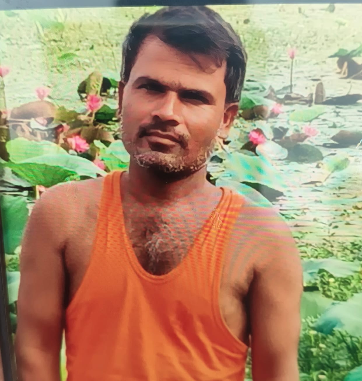 Motorcyclist dies after collision with trailer; villagers block the road.