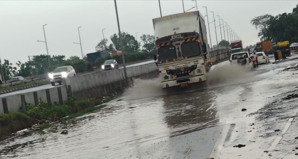 Waterlogging on the service road of the Delhi-Jaipur Highway.
