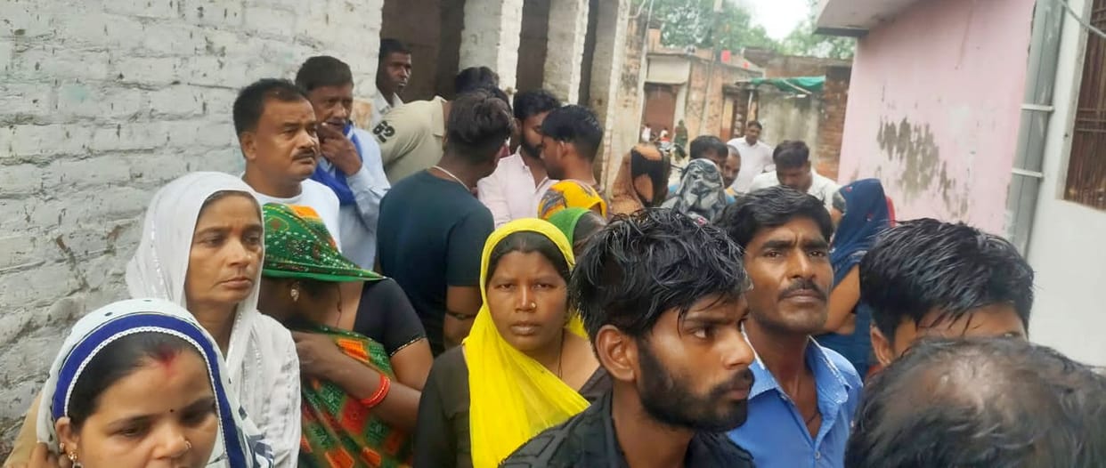 Woman's body found hanging in shop attached to her home, murder alleged