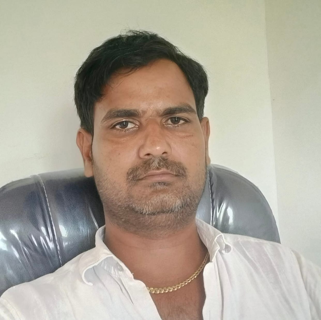 Village head's son falls onto wire spread across field; dies of electrocution.