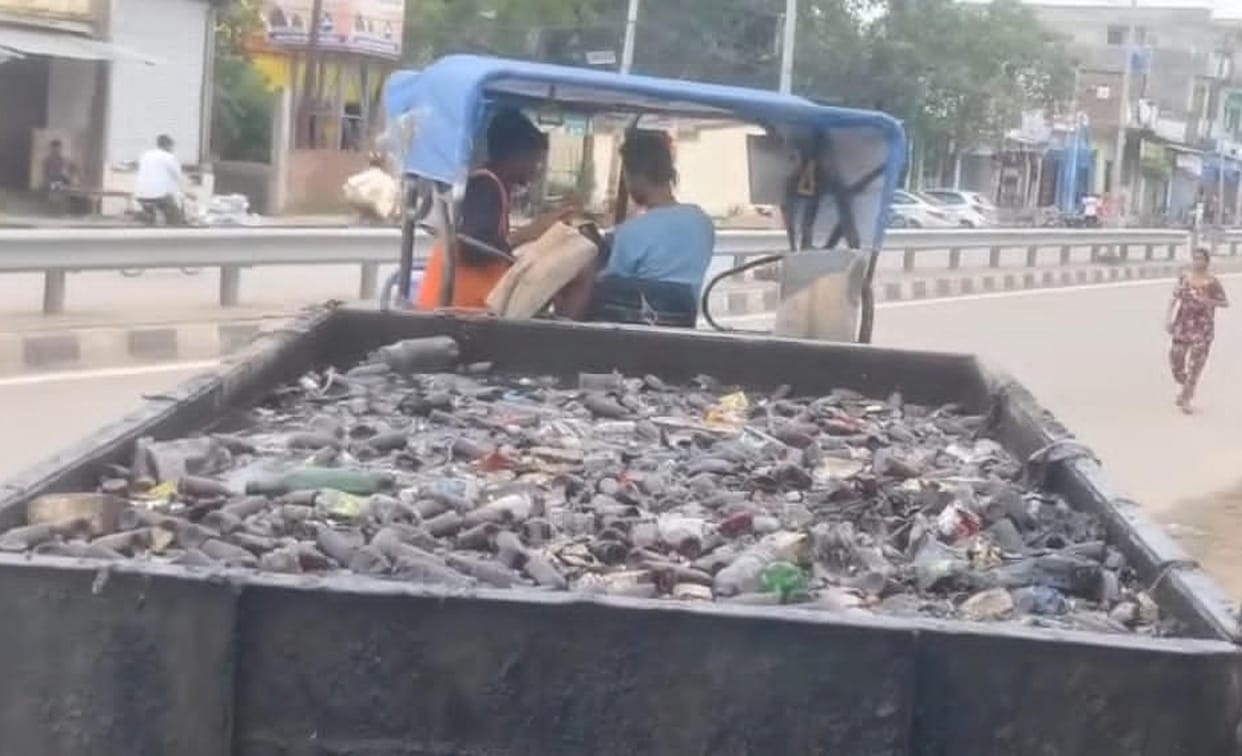 A trolley-load of empty codeine-based syrup bottles found in a drain.