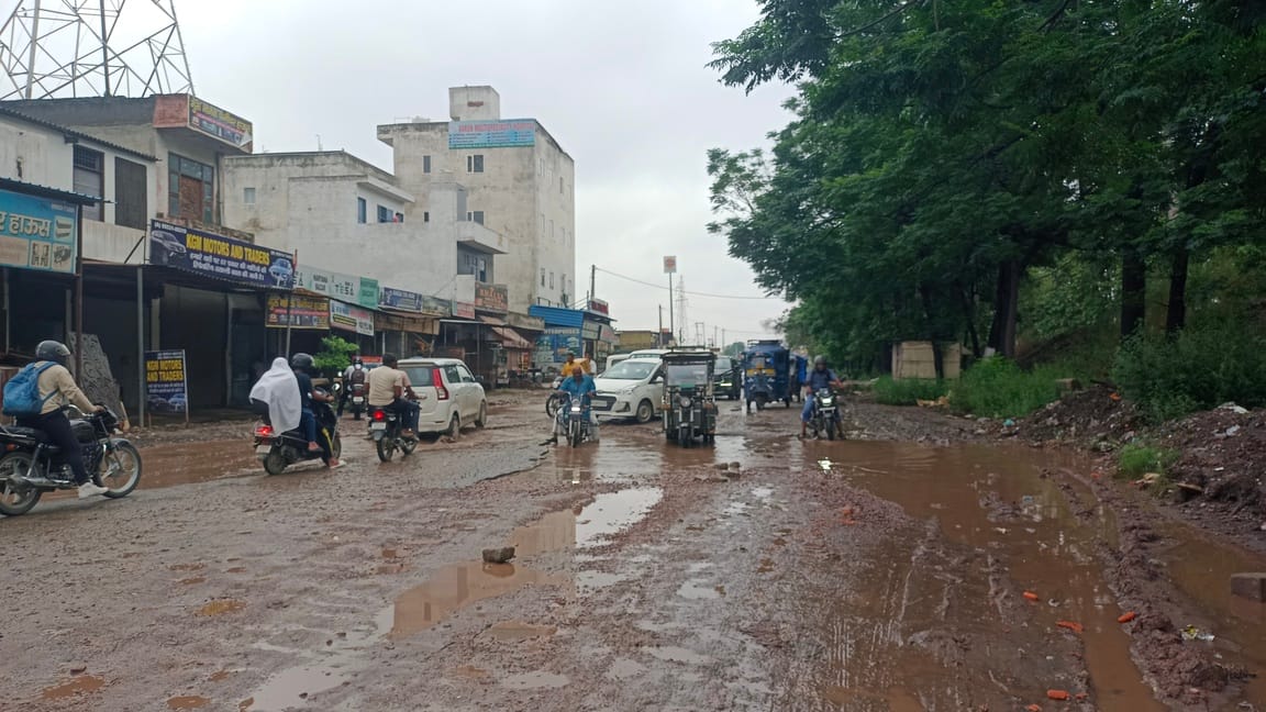 Waterlogging due to rain... Potholes add to the trouble.