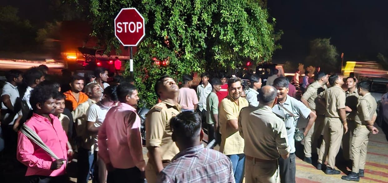 Youth climbs mobile tower after being harassed by Haryana Police; police trying to persuade him to come down.