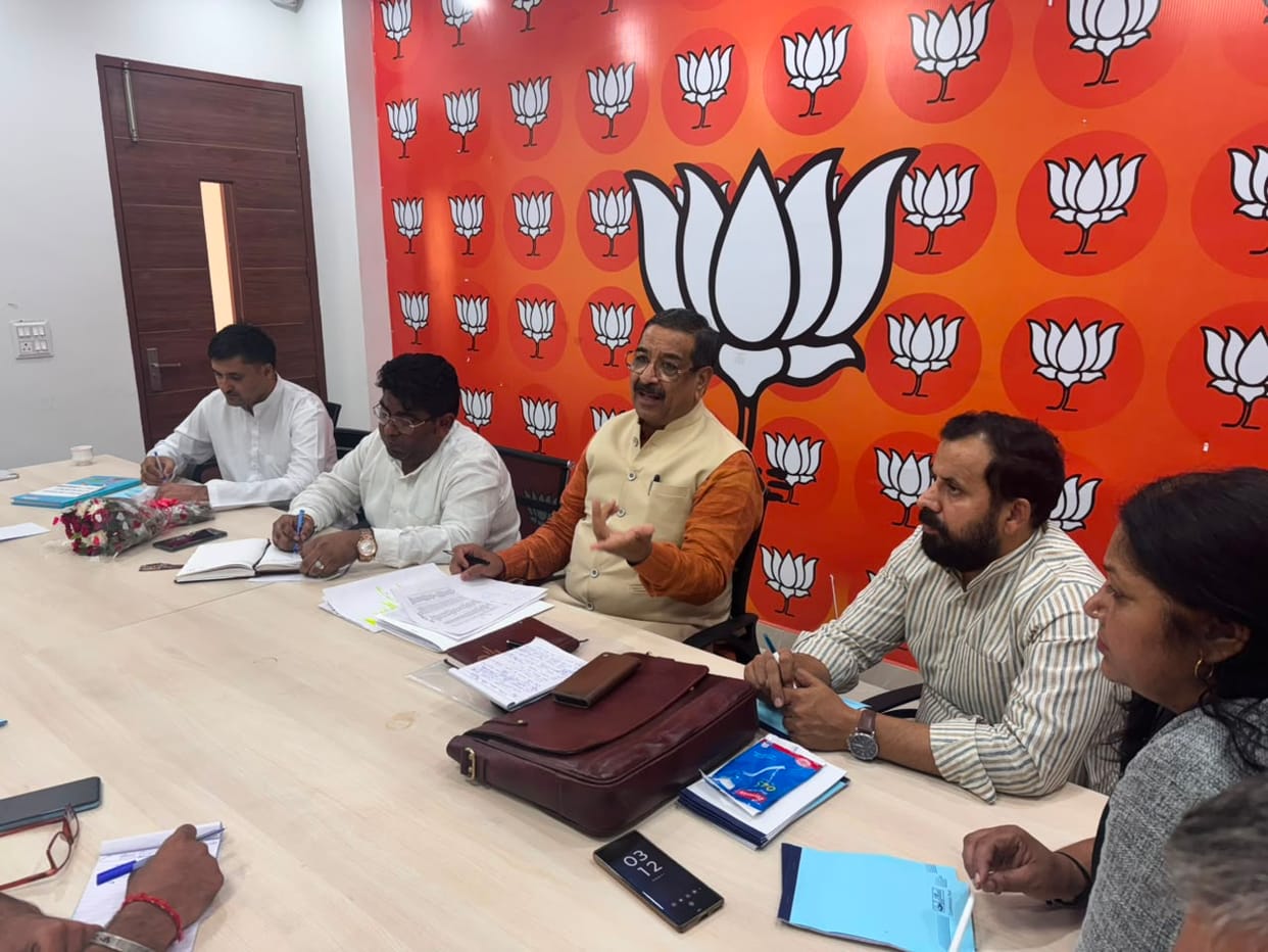 Party workers assigned duties for the PM's rally.