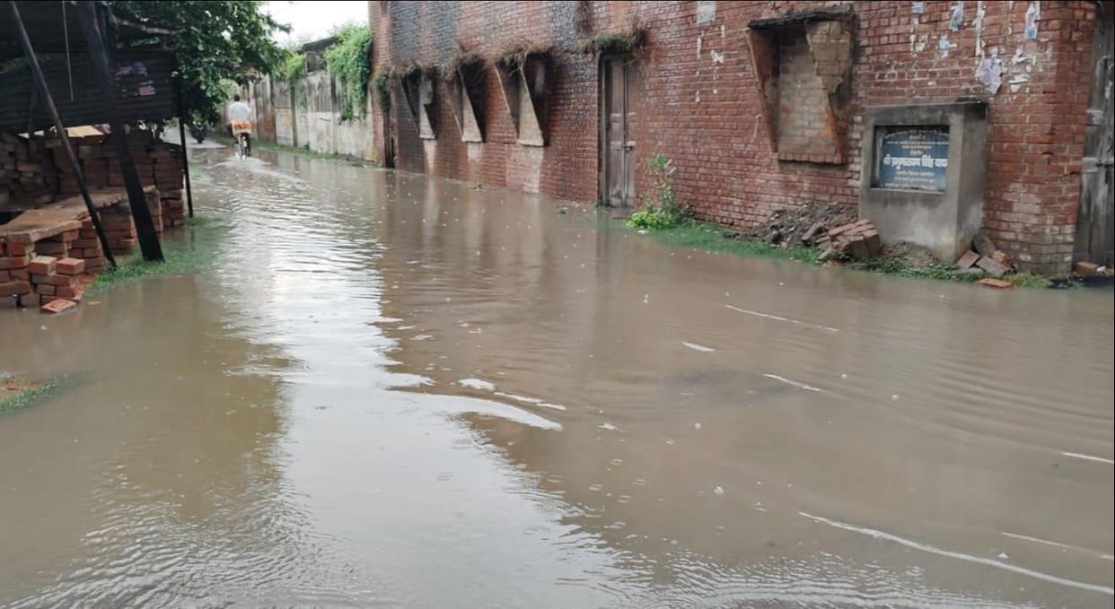 Rainwater and drainage water have inundated Chaurhat village, making it difficult for residents to step out of their homes.