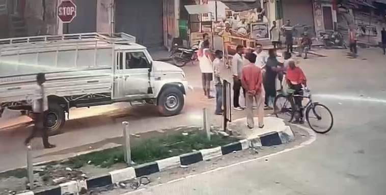 Rowdy men on a Bullet motorcycle beat up a pickup driver and brandished a firearm.