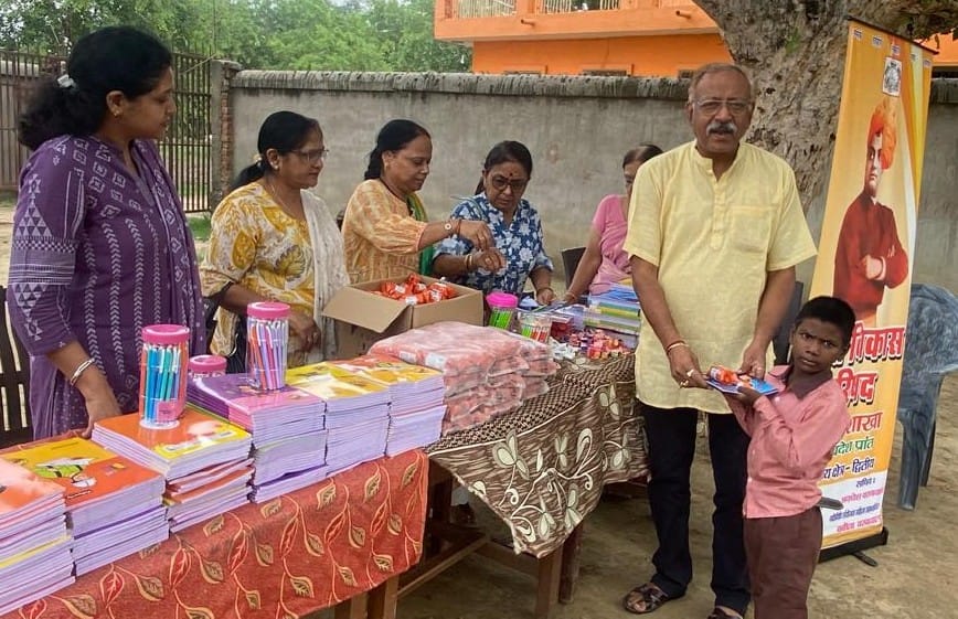 Teaching materials distributed to 265 children; faces light up with joy