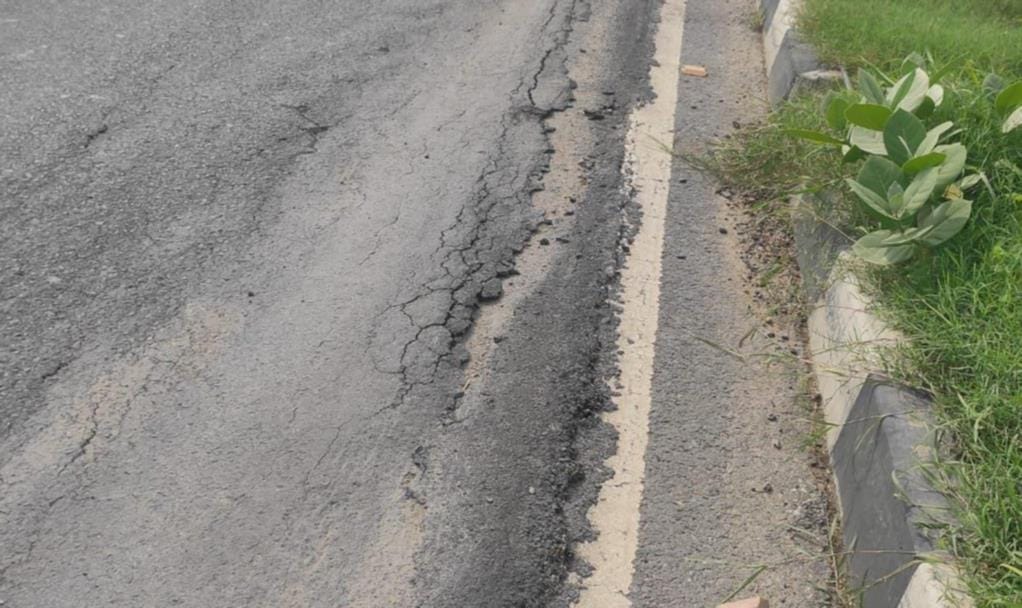 Potholes on National Highway-34 due to NHAI's negligence.