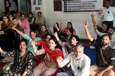 Professors registered their protest by wearing black armbands.