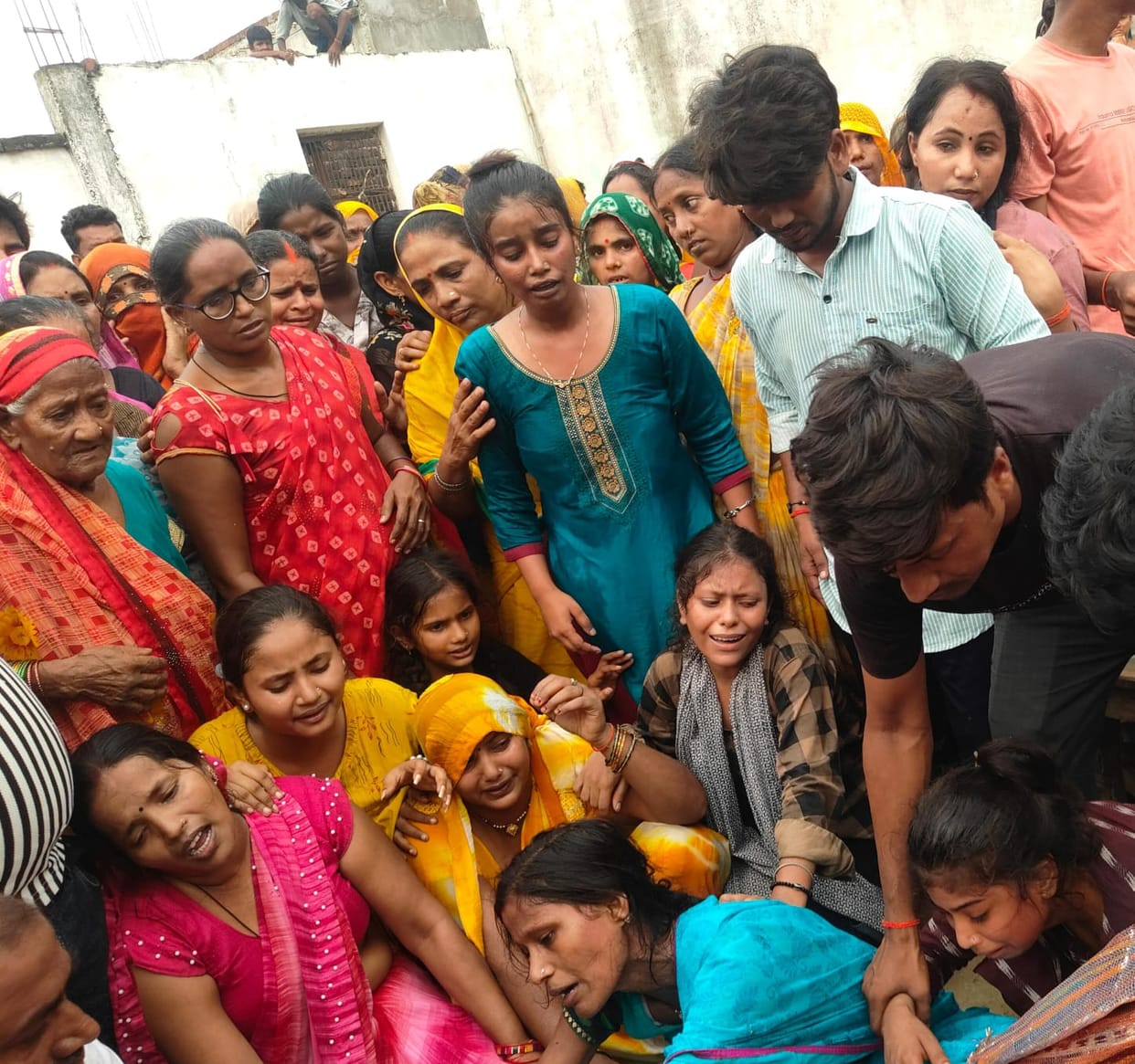 Family members broke down in inconsolable grief upon seeing their son's body