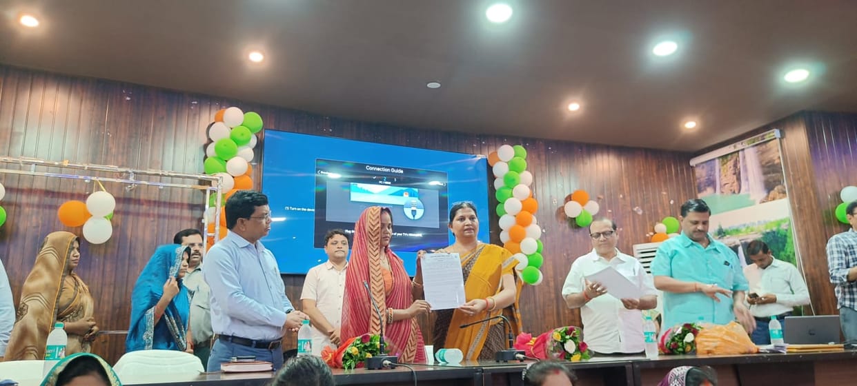 257 Anganwadi helpers receive appointment letters; faces light up with joy.