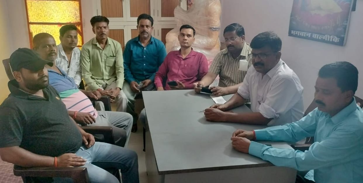 Protest against withholding of salaries of 33 employees; warning of agitation.