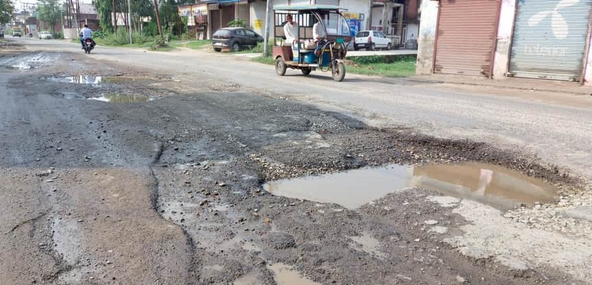 Potholes at every step, roads broken in the rain