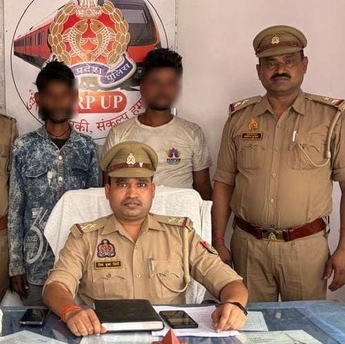 Two cunning thieves nabbed after snatching a mobile phone from a moving train and fleeing.