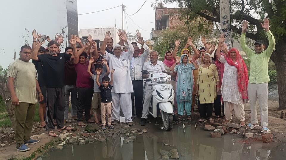 Sewer blockage turns Bharat Nagar street into a pond.