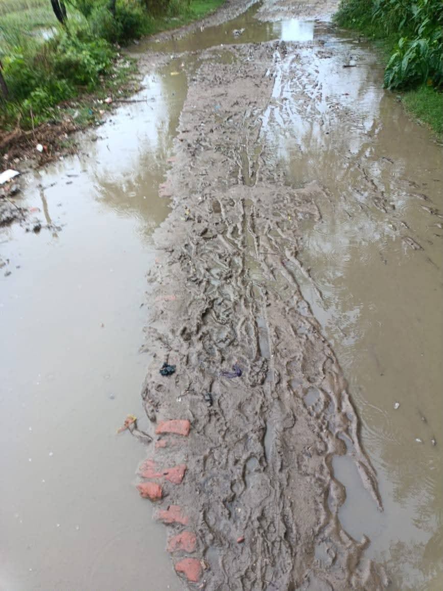 Waterlogging on the road makes commuting difficult.