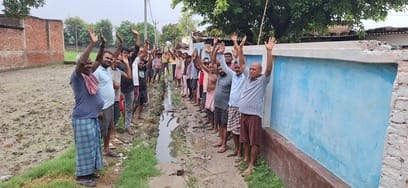 Villagers staged a protest for the construction of roads and drains.