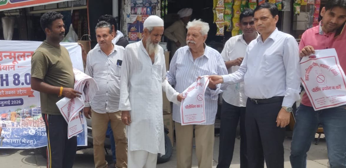 Municipality launches campaign against plastic use; distributes cloth bags.