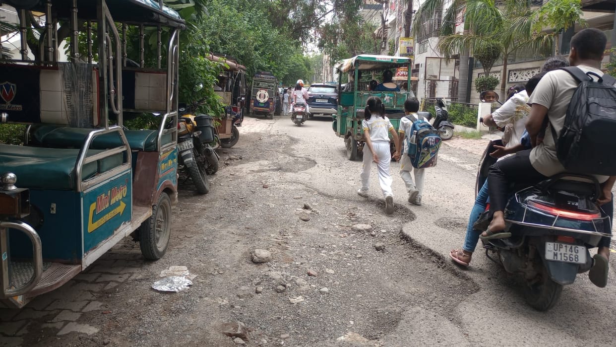 As the rainwater receded, the system's potholes became visible on the roads.