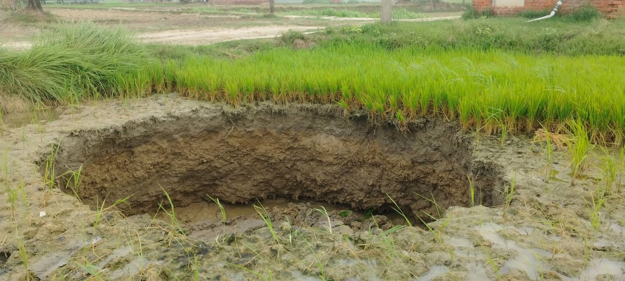 Soil began to cave in at the farm; a pit 15 feet wide and 10 feet deep formed.