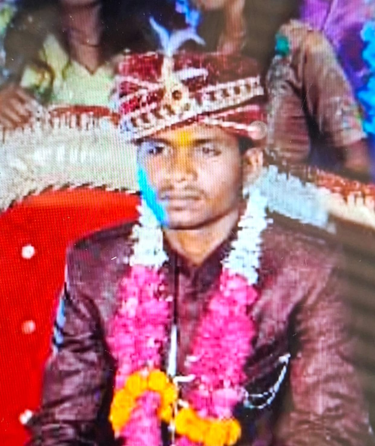 Young man commits suicide by hanging himself while alone at home.