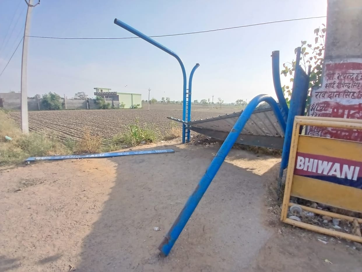 Bus queue shelters destroyed in the storm; passengers have been waiting for buses exposed to sun and rain for two months.