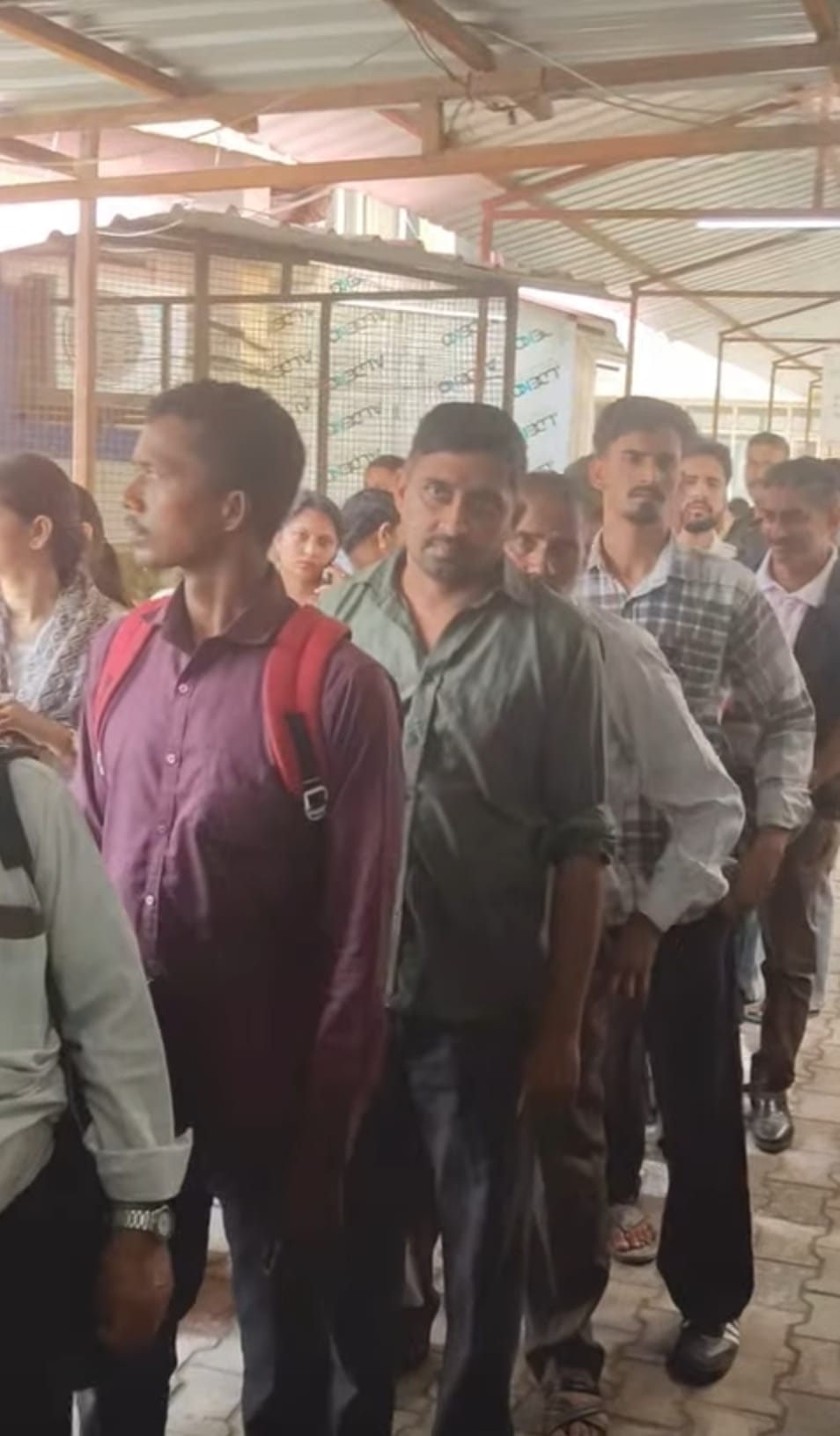 Lock hangs on the ultrasound room; long queues form to get registration slips.