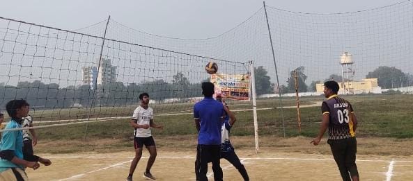 Players learning the upper-hand pass, attack, and libero defense in volleyball.