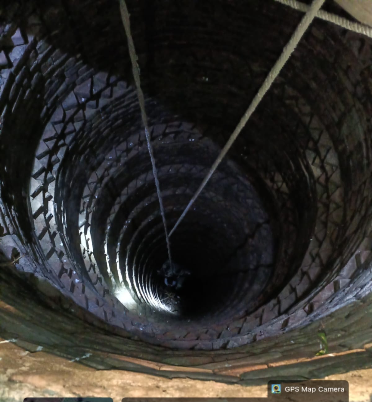 Jumped into a dry well after an argument with wife; police rescued him.