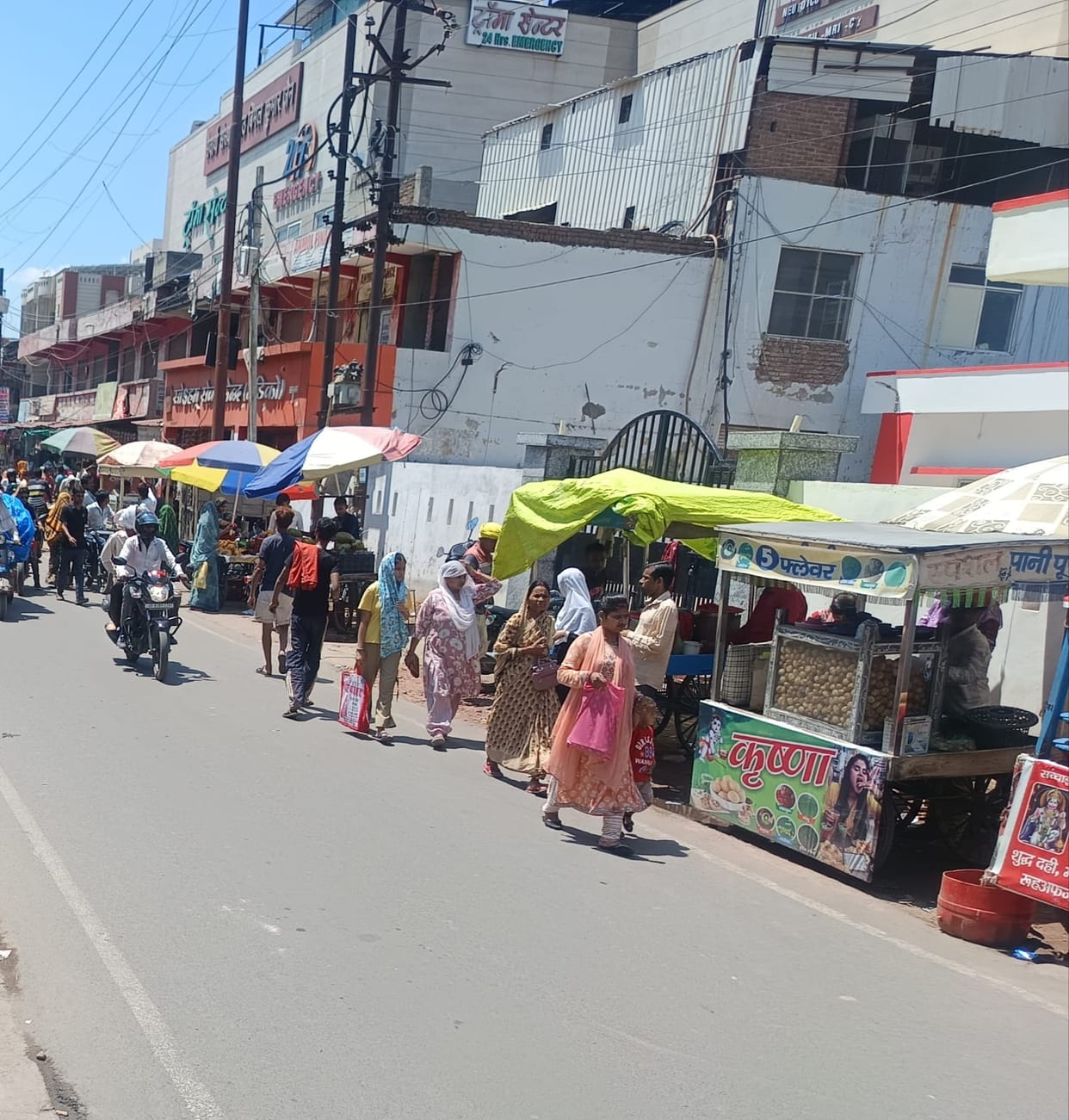 People distressed by sultry heat; temperature reaches 39 degrees.