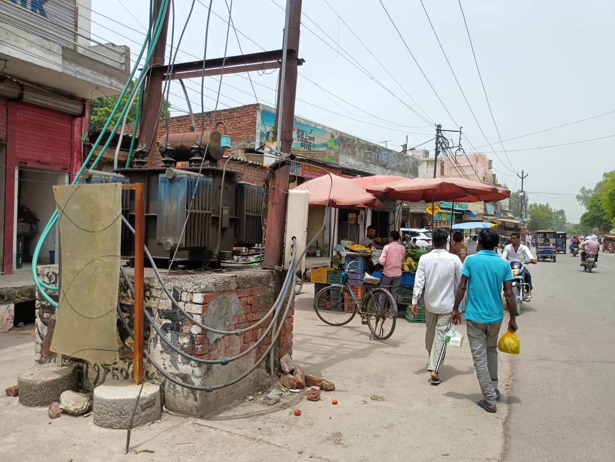 Transformers placed in the open by the roadside; constant risk of accidents.