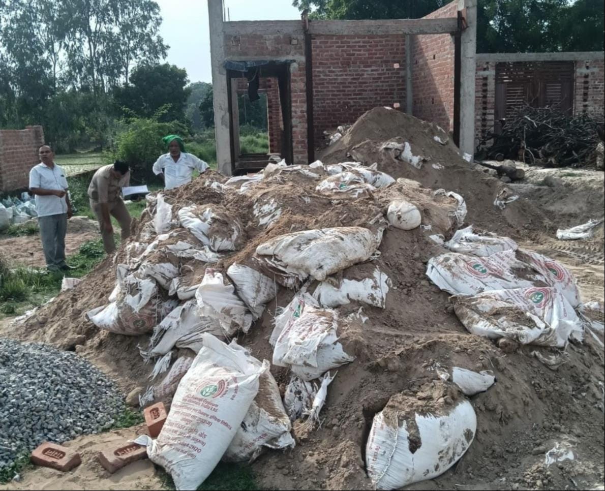 Here, the land is being filled with gypsum intended for the reclamation of barren soil.