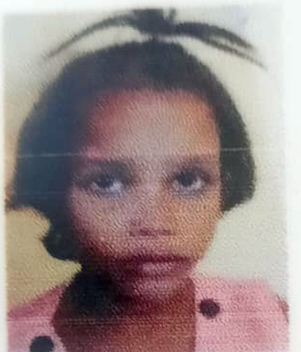 Schoolgirl playing outside her home struck by speeding car; dies.