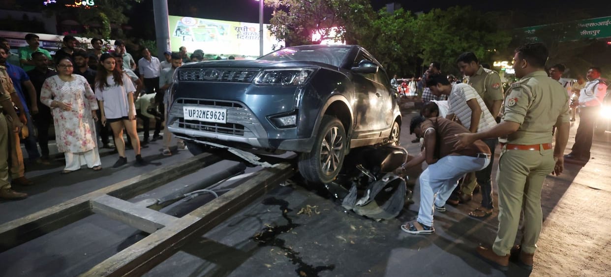 After an altercation, a young woman drove her car into two female friends; one suffered a broken leg