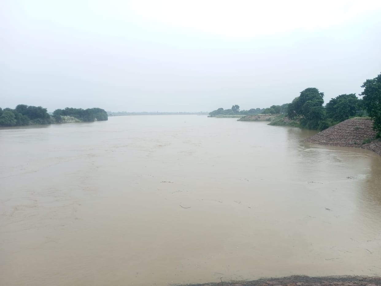 Sand embankment washed away... rain cuts and rat holes reappear on the Karmaini-Belauli embankment.
