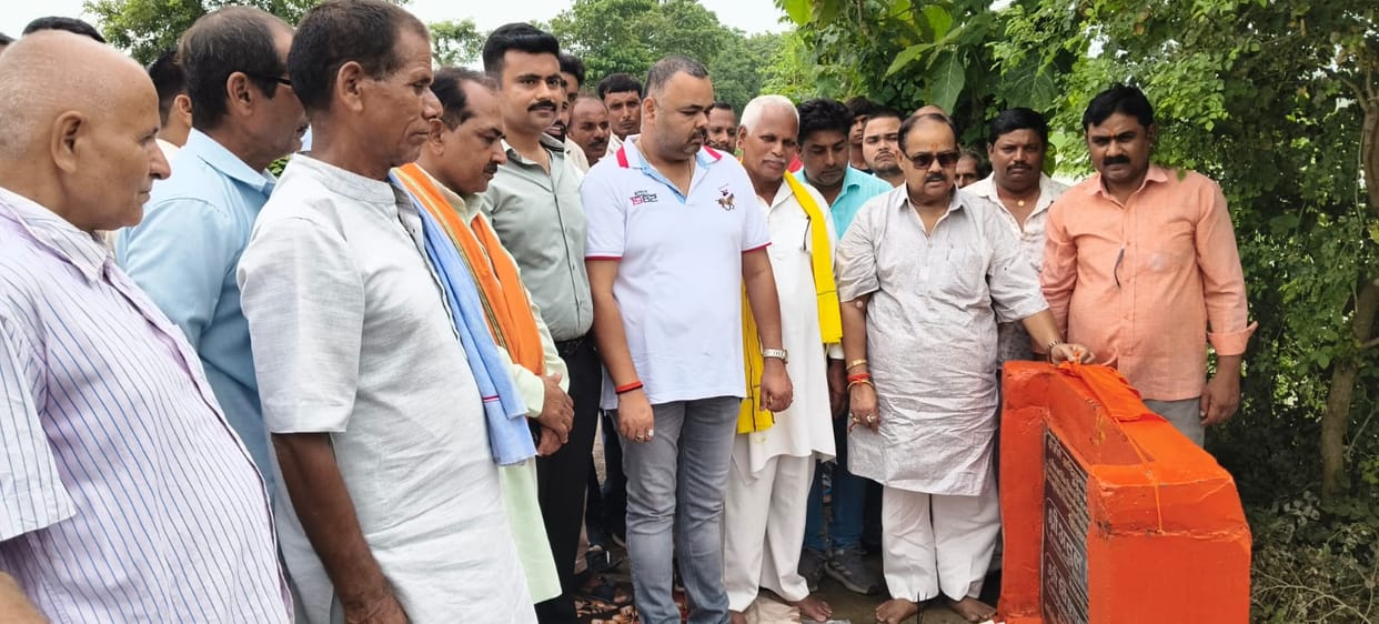 Foundation stone laid for the construction of a bitumen road.
