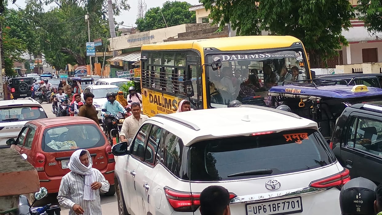 Traffic jam caused by construction material placed on two roads.