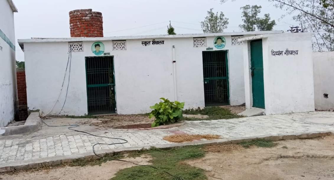 Risk of accident due to open well on primary school premises.