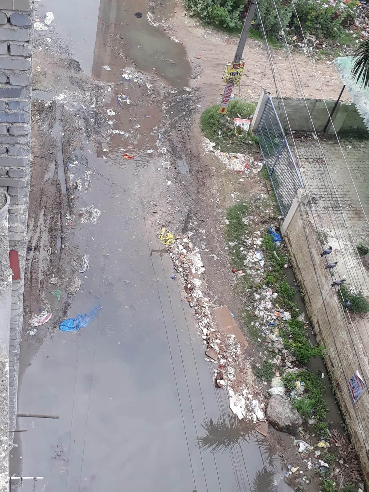 Drainage system missing from the main road of Sai Garden Society.
