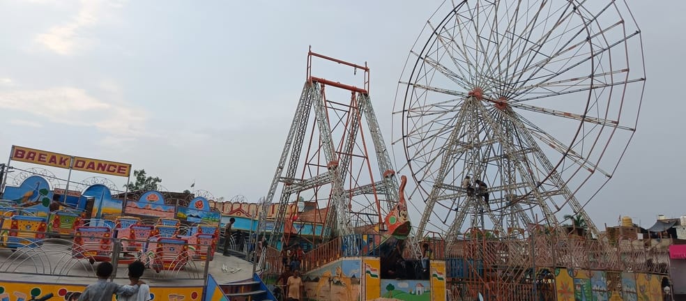 Swings started being installed and shops started getting decorated in the twentieth fair