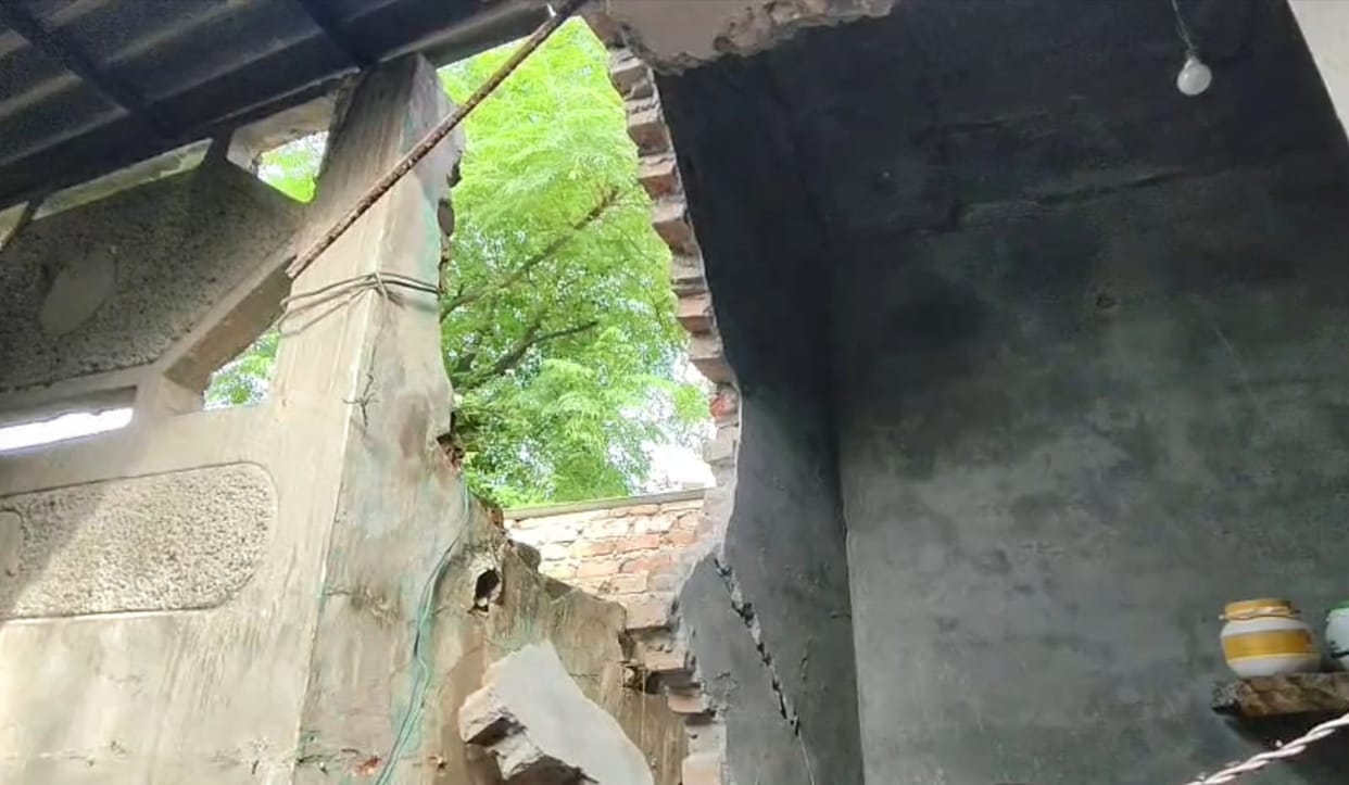 Youth scalded after cylinder explodes in kitchen; house wall collapses.