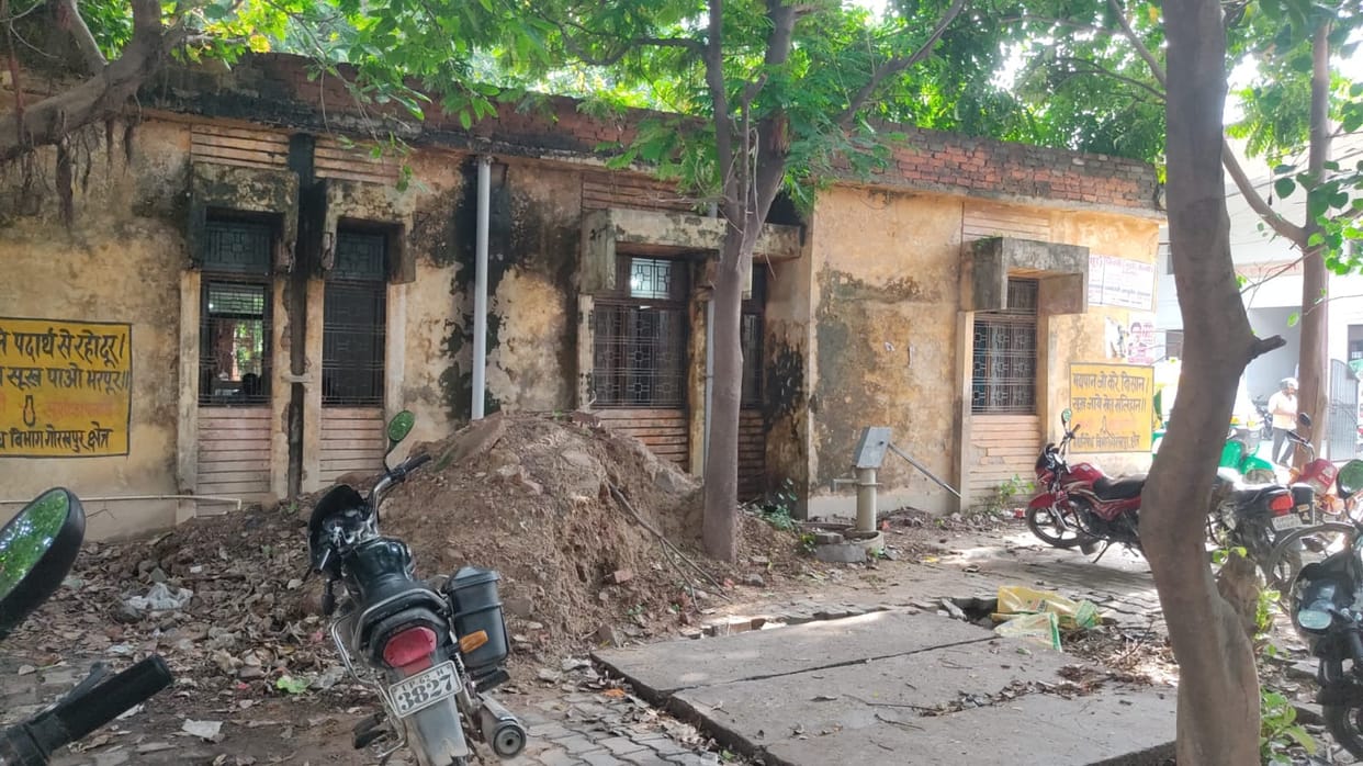 Buildings in the Muhammadabad Gohna Tehsil complex are dilapidated; justice is dispensed beneath leaking roofs.