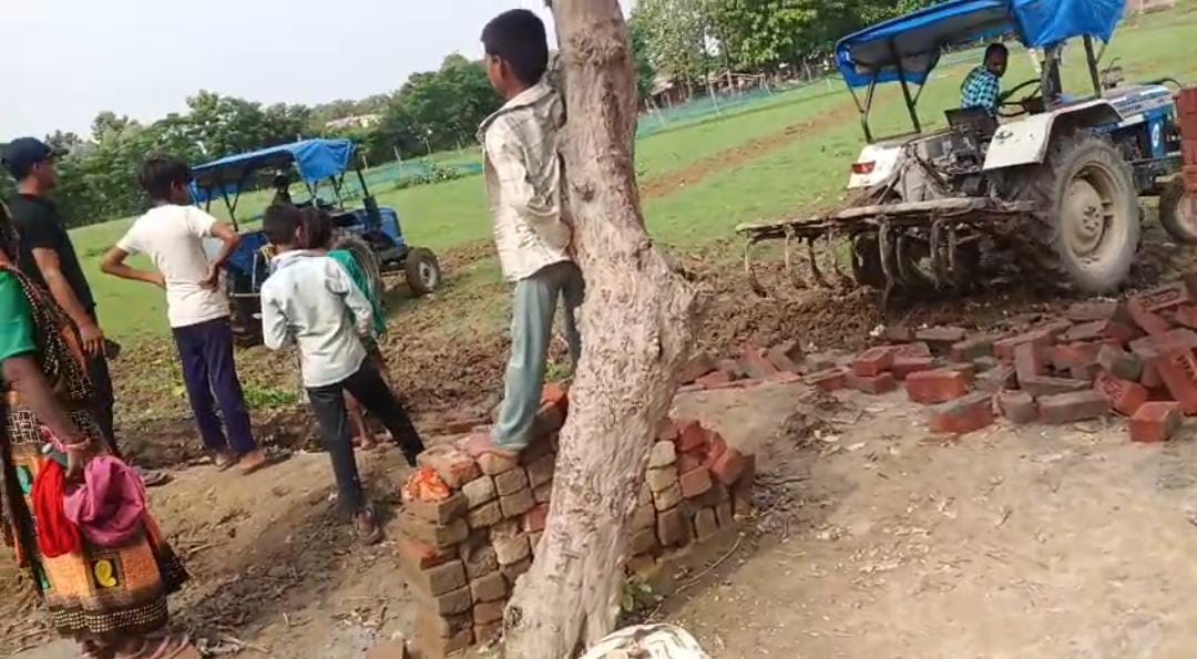 Strongmen knocked down an under-construction wall using a tractor.