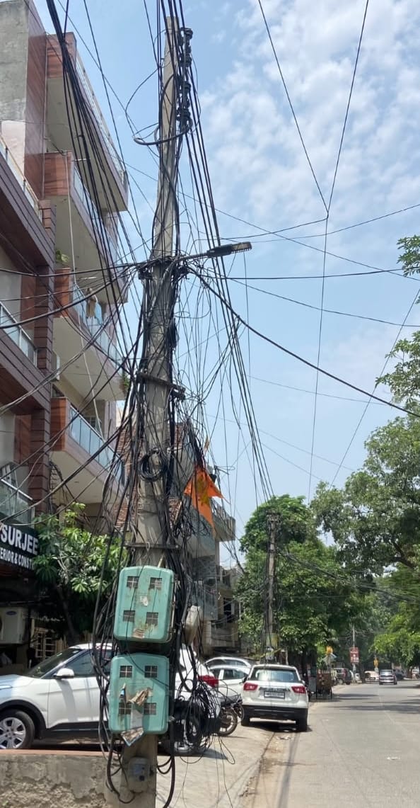 Dangling wires pose a danger; in many areas, they are hanging amidst tree branches.