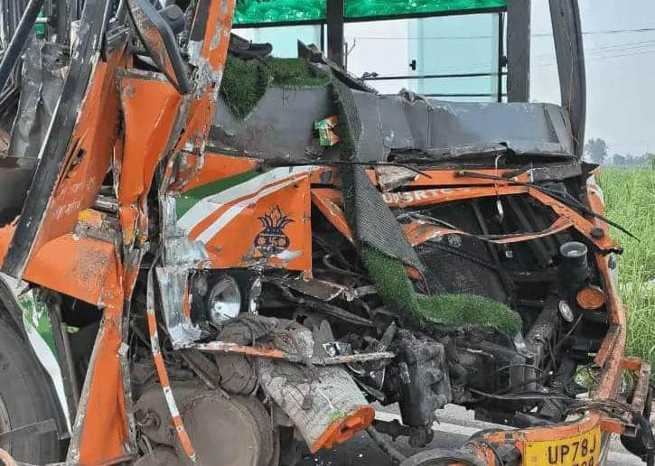Roadways bus collides with truck; 12 passengers, including the driver, injured.