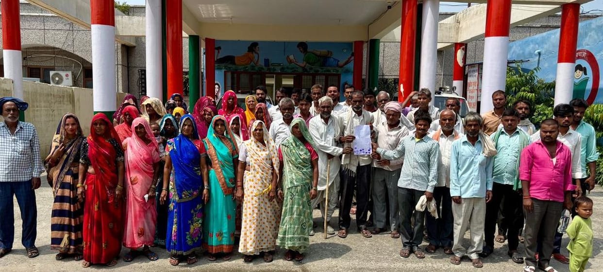Villagers protest at the Collectorate, terming the FIR false; meet the DM.